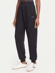 Guess Spodnie dresowe V6GB14 K3251 Czarny Regular Fit. Czarne spodnie dresowe damskie Guess, l, z aplikacjami, z dresówki. Za 294.99 zł.