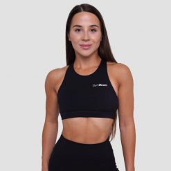 Biustonosz sportowy damski fitness bez zapięcia czarny Ignite. Czarne biustonosze sportowe damskie GYMBEAM, bez wzorów, z elastanu. Za 85.90 zł.