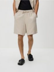 Strukturalne szorty loose - beżowy. Brązowe szorty męskie Reserved, z bawełny, bez kołnierzyka. Za 99.99 zł.