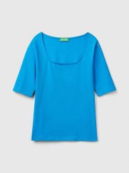 Benetton Koszulka w kolorze niebieskim rozmiar: S. Niebieskie bluzki damskie Benetton, s, bez wzorów, bez kołnierzyka, bez ramiączek. Za 35.10 zł.