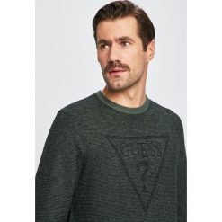 Guess Jeans - Sweter. Zielone swetry męskie Guess Jeans, m, z aplikacjami, z bawełny, bez kołnierzyka. W wyprzedaży za 169.90 zł.