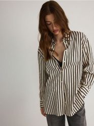 Bawełniana koszula w paski - beżowy. Brązowe koszule damskie Reserved, l, bez wzorów, z bawełny, bez kołnierzyka, bez ramiączek. W wyprzedaży za 59.99 zł.