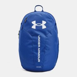 Plecak miejski UNDER ARMOUR Hustle Lite Backpack 24L. Niebieskie plecaki damskie Under Armour, bez wzorów. W wyprzedaży za 125.00 zł.
