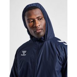 Kurtka Hummel Bench. Niebieskie kurtki damskie HUMMEL, s, bez wzorów, z materiału, sportowe, bez kaptura. W wyprzedaży za 266.00 zł.