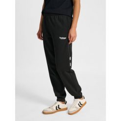 Damskie spodnie dresowe Hummel Legacy 2.0. Czarne spodnie dresowe damskie HUMMEL, na lato, bez wzorów, z dresówki. Za 269.50 zł.