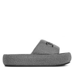Klapki Juicy Couture. Czarne klapki damskie Juicy Couture, bez wzorów, bez obcasa. Za 249.99 zł.