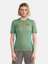 Craft Koszulka kolarska w kolorze zielonym rozmiar: L. Zielone bluzki sportowe damskie Craft, l, bez wzorów, z materiału, bez ramiączek. Za 108.99 zł.