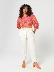 Spodnie z lnem - kremowy. Białe spodnie materiałowe damskie Sinsay, bez wzorów. Za 69.99 zł.