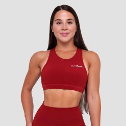 Biustonosz sportowy damski fitness bez zapięcia ciemnoczerwony Ignite. Czerwone biustonosze sportowe damskie GYMBEAM, bez wzorów, z elastanu. Za 85.90 zł.