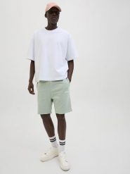 Jack & Jones Szorty dresowe "Gordon" w kolorze miętowym rozmiar: M. Zielone szorty męskie Jack & Jones, z dresówki, bez kołnierzyka. Za 79.03 zł.