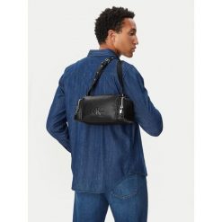 Saszetka Calvin Klein. Czarne saszetki męskie CALVIN KLEIN, z jeansu. Za 529.99 zł.