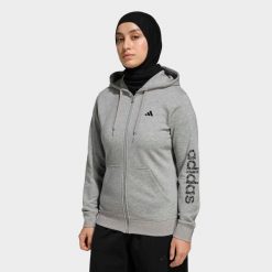 Bluza z kapturem damska ADIDAS fitness. Szare bluzy sportowe damskie Adidas, l, bez wzorów, z materiału, bez ramiączek, z kapturem. Za 199.99 zł.
