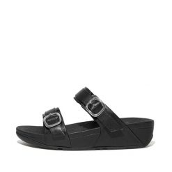 Kobiece klapki na koturnie FitFlop Lulu. Czarne klapki damskie FIT FLOP, bez wzorów, bez obcasa, na koturnie. Za 565.50 zł.