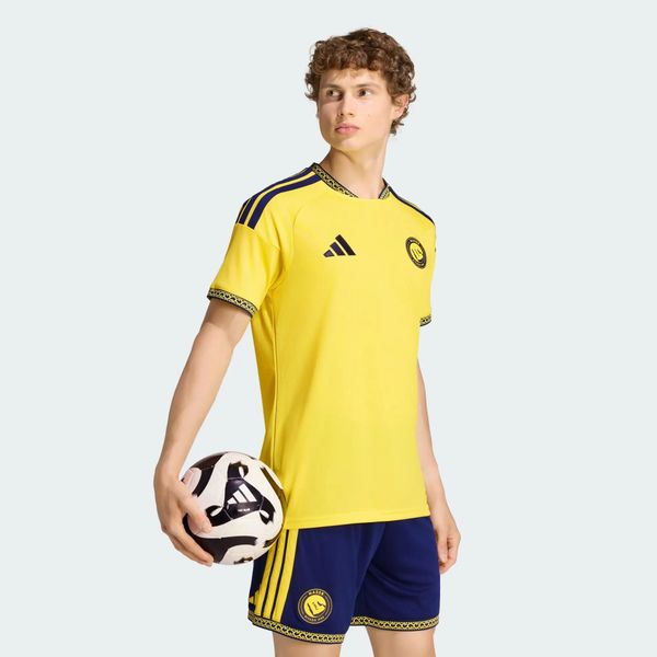 Koszulka domowa Al Nassr FC 26/27 N&N. Żółte t-shirty sportowe męskie Adidas, xs, z dzianiny, bez ramiączek, do piłki nożnej, climacool (adidas). Za 399.20 zł.