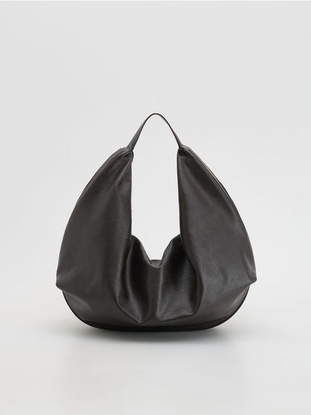 Torebka hobo - ciemnobrązowy. Brązowe torebki klasyczne damskie Reserved, bez wzorów, ze skóry, bez dodatków. Za 159.99 zł.