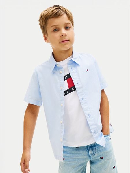 Tommy Hilfiger Koszula Essential KB0KB09554 D Niebieski jasny Regular Fit. Niebieskie koszule chłopięce Tommy Hilfiger, bez wzorów, z bawełny, bez kołnierzyka, bez ramiączek. Za 209.99 zł.