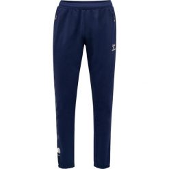 Spodnie sportowe do joggingu Hummel Move Grid. Niebieskie spodnie dresowe męskie HUMMEL, bez wzorów, z dresówki, sportowe. Za 233.50 zł.