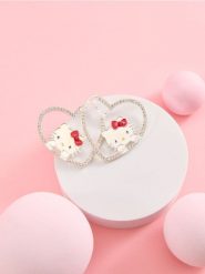 Kolczyki Hello Kitty - srebrny. Szare kolczyki damskie Sinsay, z cyrkonią, srebrne. Za 15.99 zł.