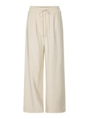 YAS Spodnie w kolorze kremowym rozmiar: 36. Brązowe spodnie materiałowe damskie YAS, bez wzorów, z materiału, z podwyższonym stanem. Za 100.52 zł.