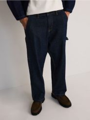 Jeansy loose fit - granatowy. Niebieskie jeansy męskie Reserved. W wyprzedaży za 79.99 zł.