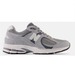 Trampki New Balance Sr. Białe trampki i tenisówki męskie New Balance, bez wzorów, z materiału, bez zapięcia. Za 853.99 zł.