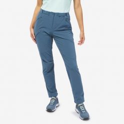 Spodnie turystyczne Quechua MH500 damskie. Niebieskie spodnie materiałowe damskie QUECHUA, bez wzorów, z bawełny, sportowe. Za 139.99 zł.