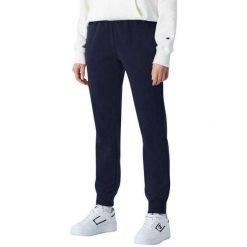 Spodnie Do Joggingu Damskie Prążkowane Ściągacze. Brązowe spodnie materiałowe damskie CHAMPION, bez wzorów, z bawełny. Za 283.99 zł.