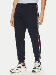 Tommy Hilfiger Spodnie dresowe Global Stripe MW0MW38696 Granatowy Regular Fit. Niebieskie spodnie dresowe męskie Tommy Hilfiger, bez wzorów, z bawełny. Za 579.99 zł.