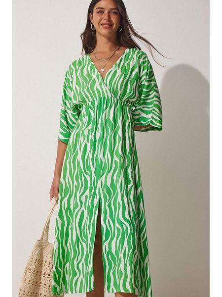 Happiness Istanbul Sukienka w kolorze zielonym rozmiar: 38. Zielone sukienki damskie Happiness Istanbul, bez wzorów, z wiskozy, bez kołnierzyka, bez ramiączek, midi, rozkloszowane. Za 86.99 zł.