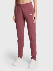 The North Face Spodnie dresowe W Nse NF0A55GS Bordowy Slim Fit. Czerwone spodnie dresowe damskie The North Face, xs, bez wzorów, z bawełny. Za 169.99 zł.