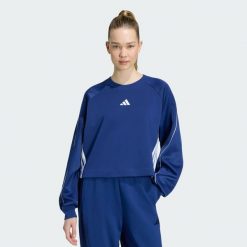 Bluza Stadium z zaokrąglonym dekoltem i 3 paskami. Niebieskie bluzy sportowe damskie Adidas, m, bez wzorów, z bawełny, bez ramiączek, bez kaptura. Za 259.00 zł.