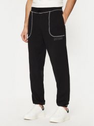 Guess Spodnie dresowe U5RB00 KCO31 Czarny Regular Fit. Czarne spodnie dresowe męskie Guess, z aplikacjami, z bawełny. Za 209.99 zł.