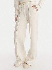 Guess Spodnie dresowe V6RB17 K9V31 Écru Regular Fit. Spodnie dresowe damskie Guess, l, z aplikacjami, z bawełny. Za 349.99 zł.