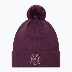 Czapka z daszkiem damska New Era Metallic Bobble Knit Beanie New York Yankees. Fioletowe czapki z daszkiem damskie New Era, bez wzorów. Za 139.99 zł.