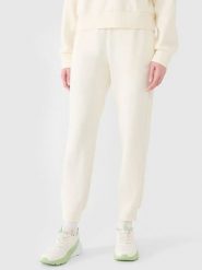 4F Spodnie dresowe w kolorze kremowym rozmiar: L. Brązowe spodnie dresowe damskie 4f, l, bez wzorów, z dresówki. Za 91.99 zł.