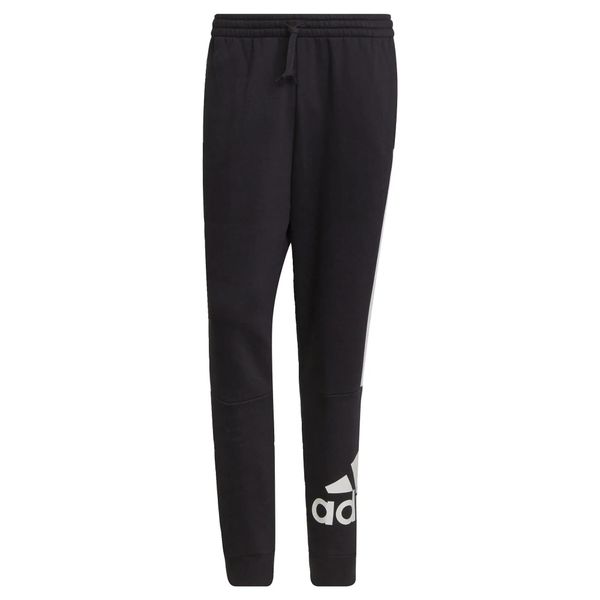 Spodnie adidas Essentials Colorblock Fleece. Białe spodnie sportowe męskie Adidas, z bawełny. Za 173.45 zł.