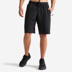 Spodenki fitness cardio męskie Domyos. Czarne szorty męskie DOMYOS, l, z materiału, do biegania. Za 79.99 zł.