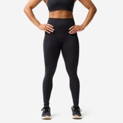 Legginsy fitness damskie Domyos. Czarne legginsy damskie DOMYOS, l, bez wzorów, z elastanu, na fitness i siłownię. Za 129.99 zł.
