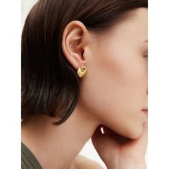 Kolczyki Guess. Żółte kolczyki damskie Guess, złote. Za 109.99 zł.