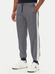 Guess Spodnie dresowe Z5BB19 K2042 Granatowy Regular Fit. Niebieskie spodnie dresowe męskie Guess, z aplikacjami, z dresówki. Za 524.99 zł.
