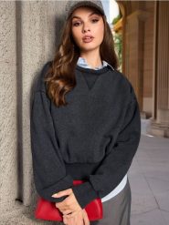 Bluza - czarny. Czarne bluzy bez kaptura damskie Sinsay, l. Za 39.99 zł.