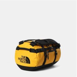Torba Base Camp XS Żółty - NF0A52SS4WP. Żółte torebki klasyczne damskie The North Face, bez wzorów, z materiału, bez dodatków. W wyprzedaży za 480.65 zł.