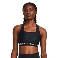 Biustonosz fitness Under Armour Crossback Mid Print. Brązowe biustonosze sportowe damskie Under Armour, bez wzorów. Za 139.99 zł.