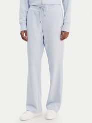 DKNY Sport Spodnie dresowe DP6P3794 Błękitny Regular Fit. Niebieskie spodnie sportowe damskie DKNY Sport, xs, z bawełny. Za 309.99 zł.