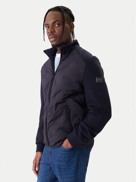 Guess Kurtka przejściowa M6RL10 WJ232 Granatowy Regular Fit. Niebieskie kurtki męskie Guess, m, z aplikacjami, z syntetyku, bez kaptura. Za 799.99 zł.