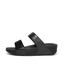 Kobiece klapki na koturnie FitFlop Lulu Hotfix. Czarne klapki damskie FIT FLOP, bez wzorów, z materiału, bez obcasa, na koturnie. Za 382.80 zł.