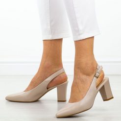 Cieliste czółenka damskie na słupku z odkrytą pietą Sergio Leone Sk162. Czółenka damskie Sergio Leone, bez wzorów, ze skóry, bez obcasa, na słupku. W wyprzedaży za 147.87 zł.