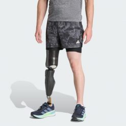 Szorty Own The Run Spray Dye 2-In-1. Czarne spodenki sportowe damskie Adidas, bez wzorów, sportowe. Za 239.00 zł.