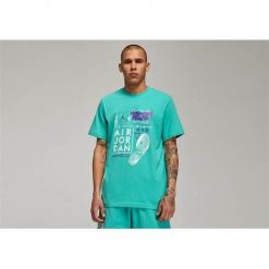 Koszulka sportowa męska Nike Air Jordan Brand Graphic Crew 2. Niebieskie t-shirty sportowe męskie Nike, m, z bawełny, bez ramiączek. Za 248.00 zł.
