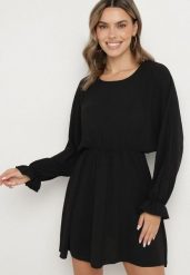 Czarna Sukienka o Rozkloszowanym Kroju z Ozdobnymi Mankietami Terellea. Czarne sukienki damskie Born2be, na co dzień, bez wzorów, z jeansu, eleganckie, bez kołnierzyka, bez ramiączek, mini, kopertowe. W wyprzedaży za 71.99 zł.